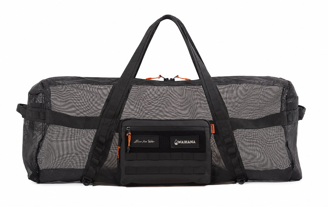 Waihana Expedition Duffel in black mesh with orange zipper pulls, reinforced nylon webbing straps, and a front MOLLE-style zippered pocket displaying the Waihana logo, shown on a white studio background.